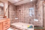 Extra large luxurious shower with 2 showerheads.